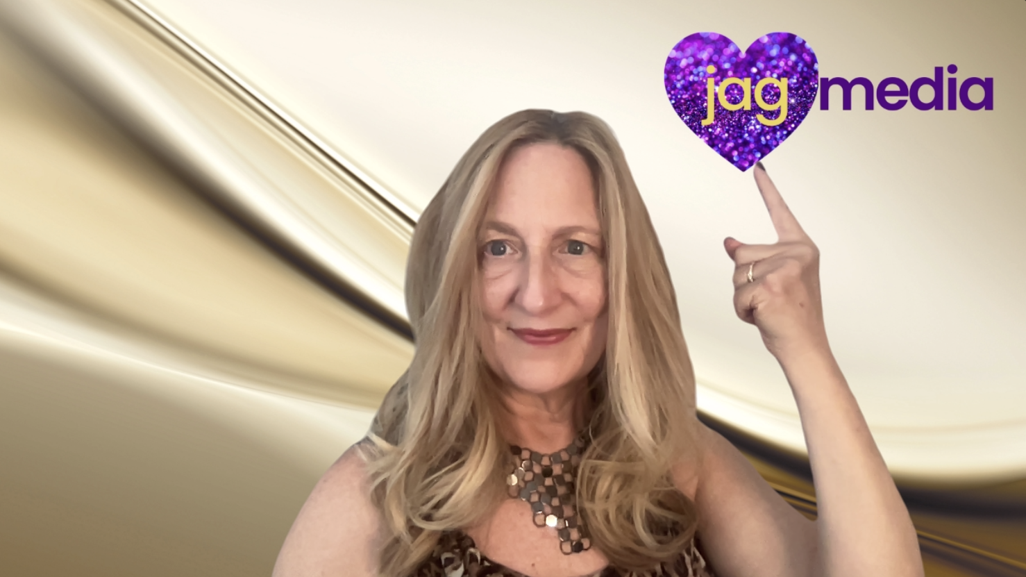 Janet JAGmedia Design with Heart Janet points JAGmedia heart logo